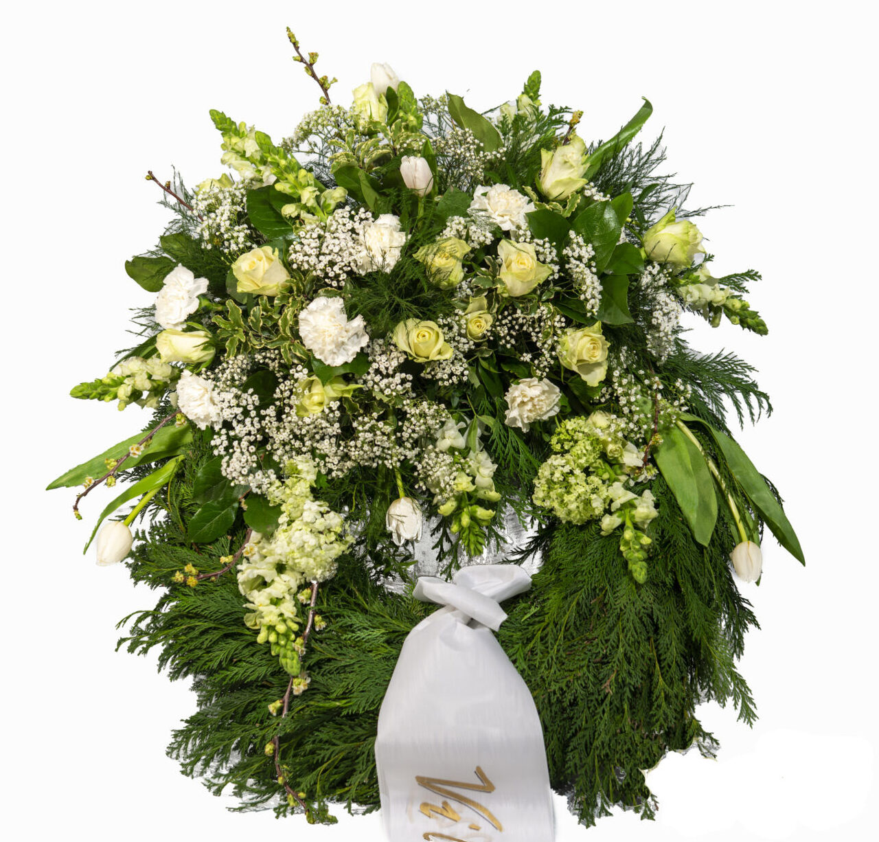 Begravningskransen med ljusa blommor